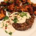 Quinoa patties are served with chanterelles and topped with tahini sauce. (Photo by Yakir Levy)