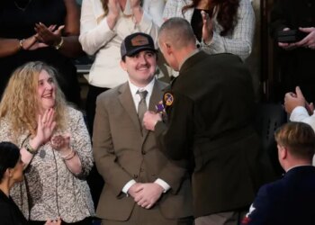 West Virginia National Guard Staff Sgt. Andrew Wolfe is awarded a Purple Heart