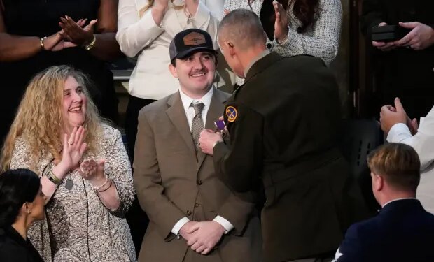 West Virginia National Guard Staff Sgt. Andrew Wolfe is awarded a Purple Heart