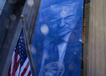 New banner depicting U.S. President Donald Trump is put up on the Department of Justice building in Washington, D.C.
