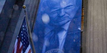 New banner depicting U.S. President Donald Trump is put up on the Department of Justice building in Washington, D.C.