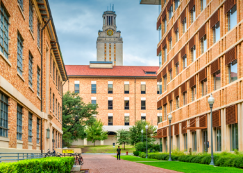 Student walks on the University of Texas campus