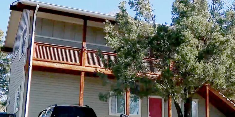 Exterior view of a residence associated with Delta Tau Delta near Northern Arizona University