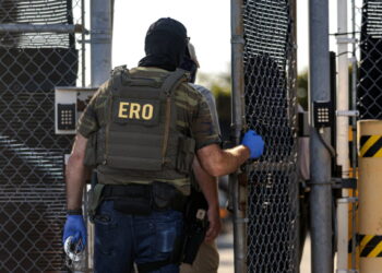 Federal agents unload detainees at the Broadview ICE detention center