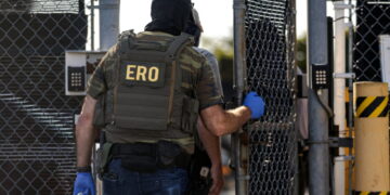 Federal agents unload detainees at the Broadview ICE detention center