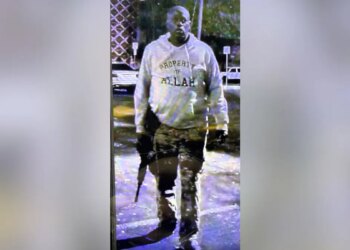 Austin shooting suspect wearing hoodie referencing Allah and carrying rifle
