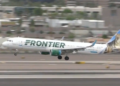 A Frontier plane takes off at the Atlanta airport