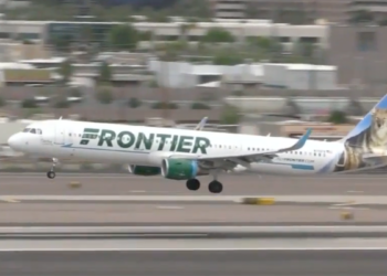 A Frontier plane takes off at the Atlanta airport