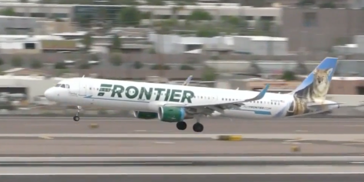 A Frontier plane takes off at the Atlanta airport