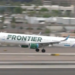 A Frontier plane takes off at the Atlanta airport
