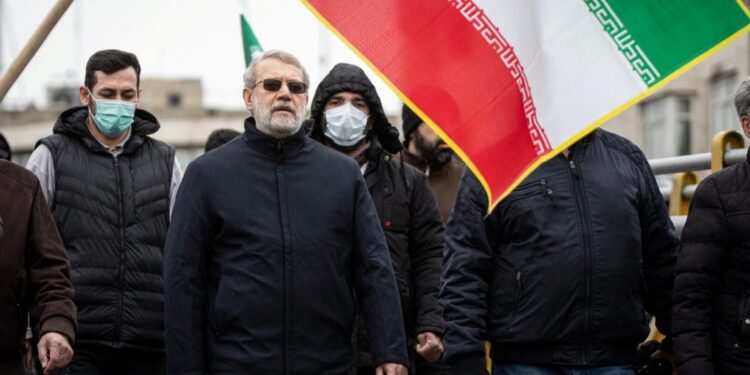 FILE PHOTO: Iranian security chief Ali Larijani takes part in a pro-government rally in Tehran