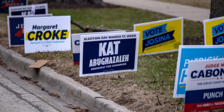 Kat Abughazaleh participates in a door knocking event while campaigning for the 2026 Illinois Primary Election