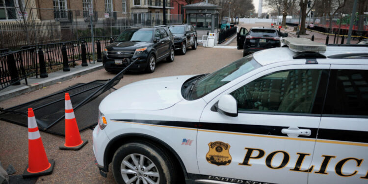 Gate damaged outside the White House in Washington.