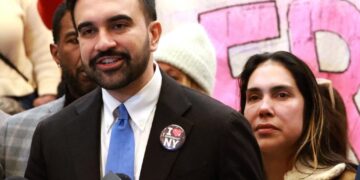 New York City high school student Dylan Contreras attends a news conference in New York