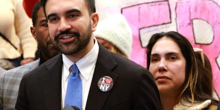 New York City high school student Dylan Contreras attends a news conference in New York
