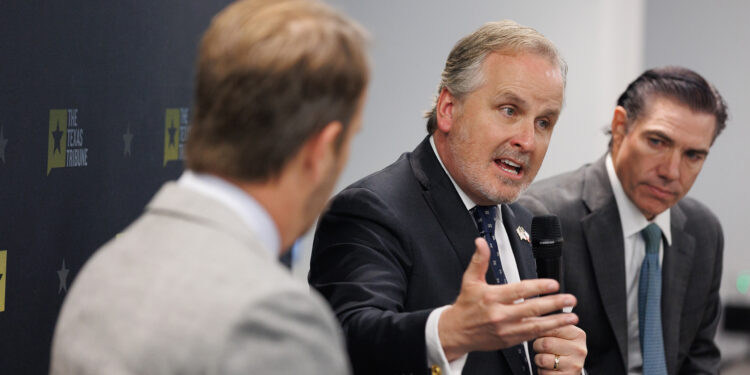 State Sen. Bryan Hughes, R-Mineola, answers questions as state Rep. Morgan Meyer, R-University Park, listens during The Texas Tribune’s Y’all Street event, held at the Dallas Regional Chamber in Dallas on March 24, 2026.