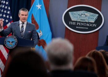 U.S. Secretary of Defense Pete Hegseth and Chairman of the Joint Chiefs of Staff General Dan Caine hold a briefing amid th...