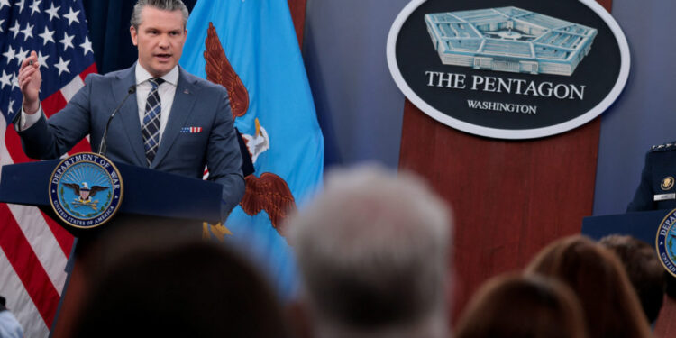 U.S. Secretary of Defense Pete Hegseth and Chairman of the Joint Chiefs of Staff General Dan Caine hold a briefing amid th...
