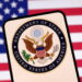Illustration shows United States Department of State logo and U.S. flag