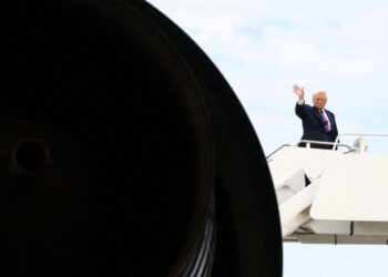 U.S. President Donald Trump boards Air Force One at Joint Base Andrews in Maryland