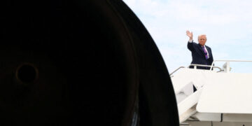 U.S. President Donald Trump boards Air Force One at Joint Base Andrews in Maryland