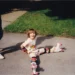 The author learning to roller skate as a child.