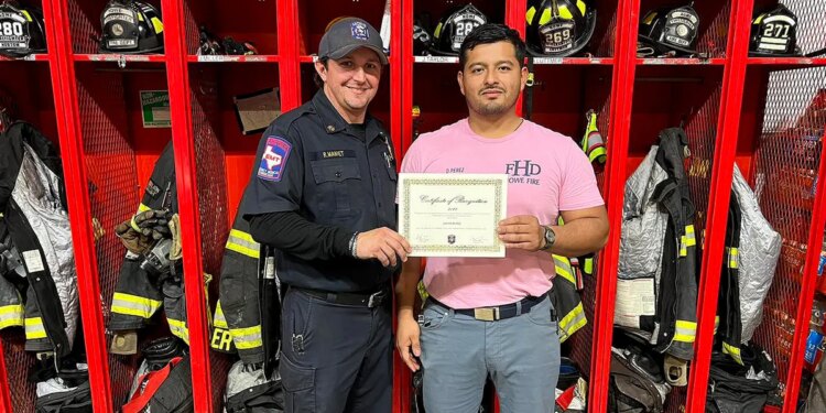 fire department honors Perez-Glass with certificate.
