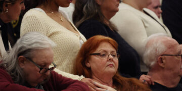 Friends and family members of some of the victims of convicted Gilgo Beach serial killer Rex Heuermann attend a press conf...