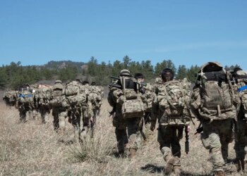 Cadets hike through woods