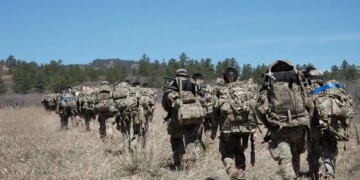Cadets hike through woods