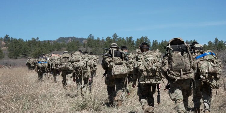 Cadets hike through woods