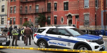 Boston Police and investigators are at a brownstone