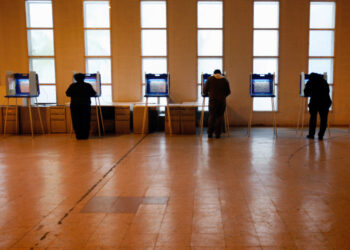 Voters cast their ballots at a polling station in Providence