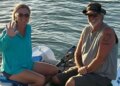 Brian and Lynette Hooker on dinghy