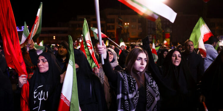 People gather after a two-week ceasefire in the Iran war was announced, in Tehran