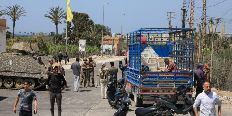 Aftermath of an Israeli strike that severed the last remaining bridge linking southern Lebanon to the rest of the country,...