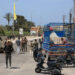 Aftermath of an Israeli strike that severed the last remaining bridge linking southern Lebanon to the rest of the country,...