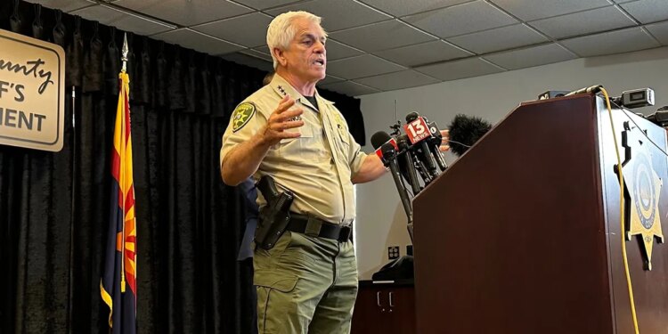 Chris Nanos speaking at a news conference regarding Nancy Guthrie.