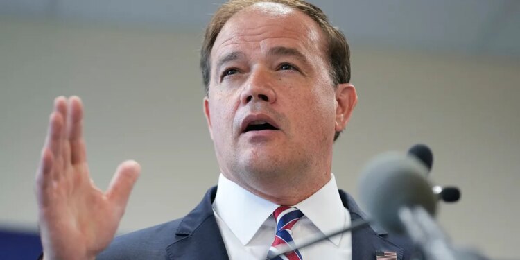 Suffolk County District Attorney Ray Tierney speaking to reporters at a news conference