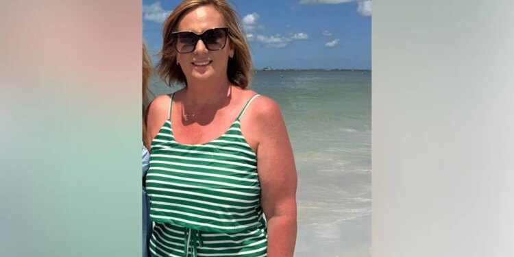 Ericka Kramer standing on a beach