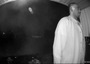 a man seen on door camera outside home