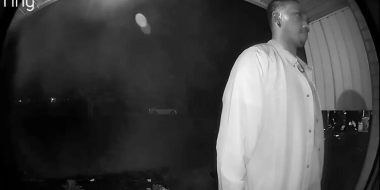 a man seen on door camera outside home