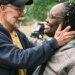 Jimmy Dorrell greets longtime attendees and friends of Church Under the Bridge during his final service as pastor on Easter Sunday.
