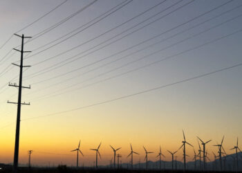 Wind turbines are show at sunrise in Palm Springs, California