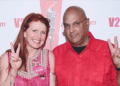 Tycoon Neville Roy Singham speaking at a forum with Jodie Evans