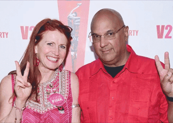 Tycoon Neville Roy Singham speaking at a forum with Jodie Evans