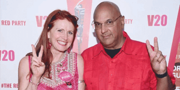 Tycoon Neville Roy Singham speaking at a forum with Jodie Evans