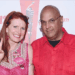 Tycoon Neville Roy Singham speaking at a forum with Jodie Evans