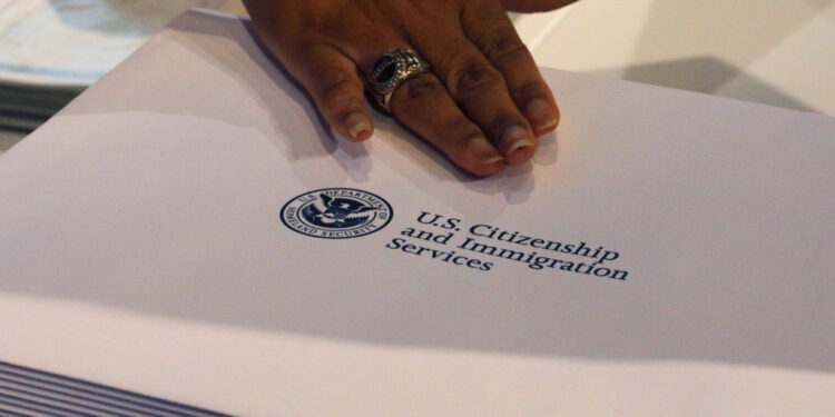 Information packs are distributed by the U.S. Citizenship and Immigration Services following a citizenship ceremony at the...