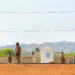 FILE PHOTO: Malian soldiers stand near a truck during a patrol following the attack on Mali's main military base Kati, out...